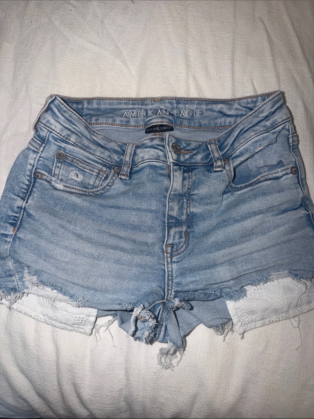 American Eagle Outfitters Light Blue Denim Cutoff Shorts with Lace Panels